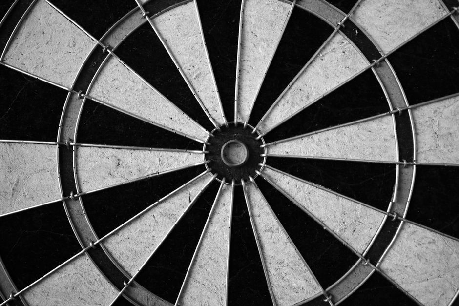Club members enjoying a darts game in the social area