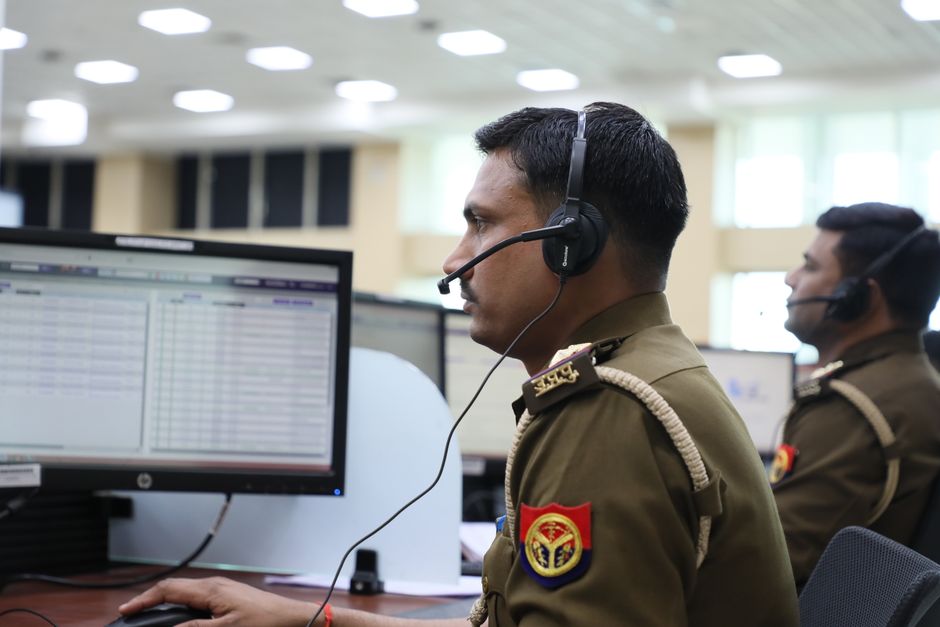 Logistics staff managing interstate shipments in a dispatch office