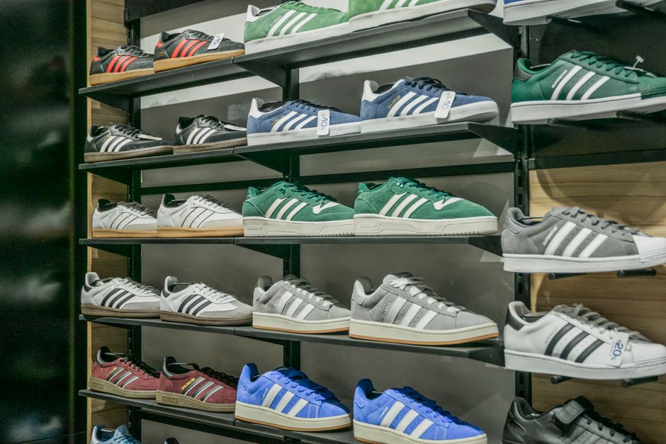 Display of sport cleats and athletic shoes in a sporting goods shop