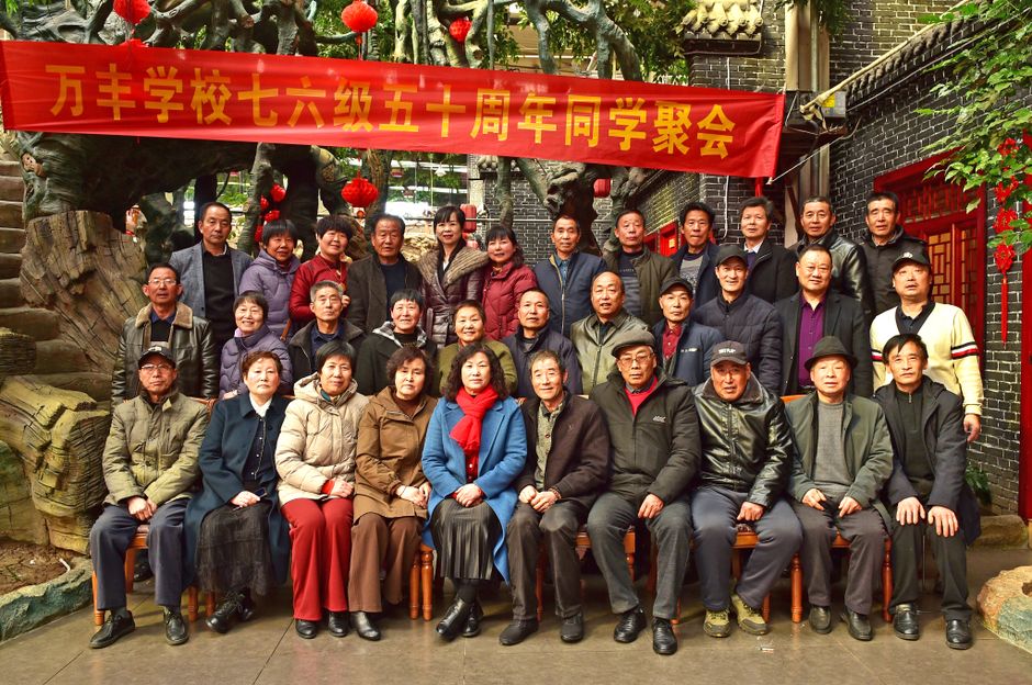 Group of former professional baseball players posing together