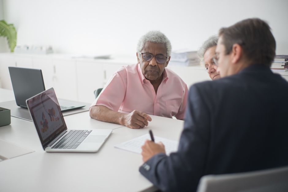 Independent insurance broker meeting with clients