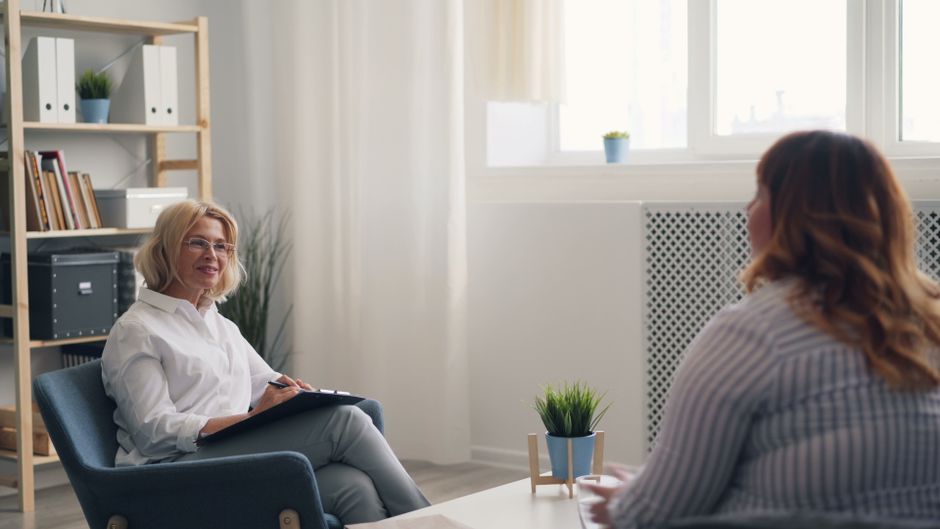 Therapist using DBT worksheets with client