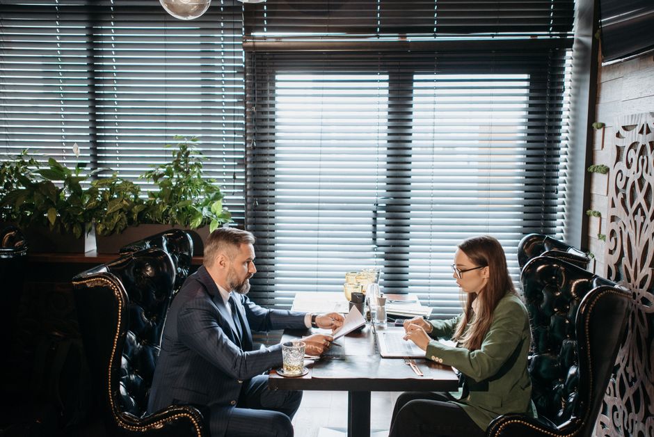 Business professionals discussing restaurant franchise plans