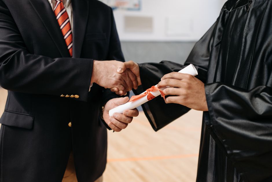 University students receiving scholarships during award ceremony
