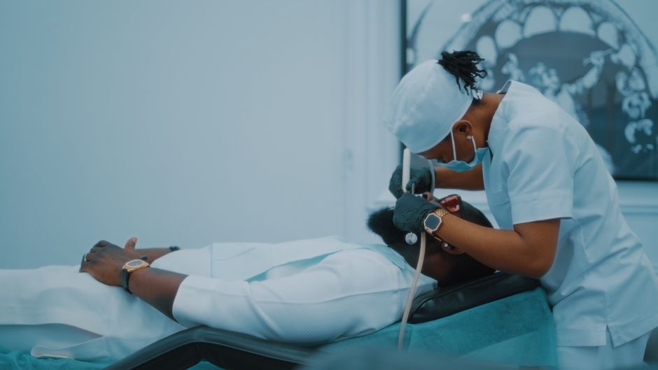 Dentist providing general dental care