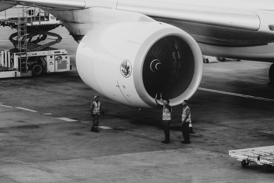 Travel specialist helping with disrupted flight rebooking