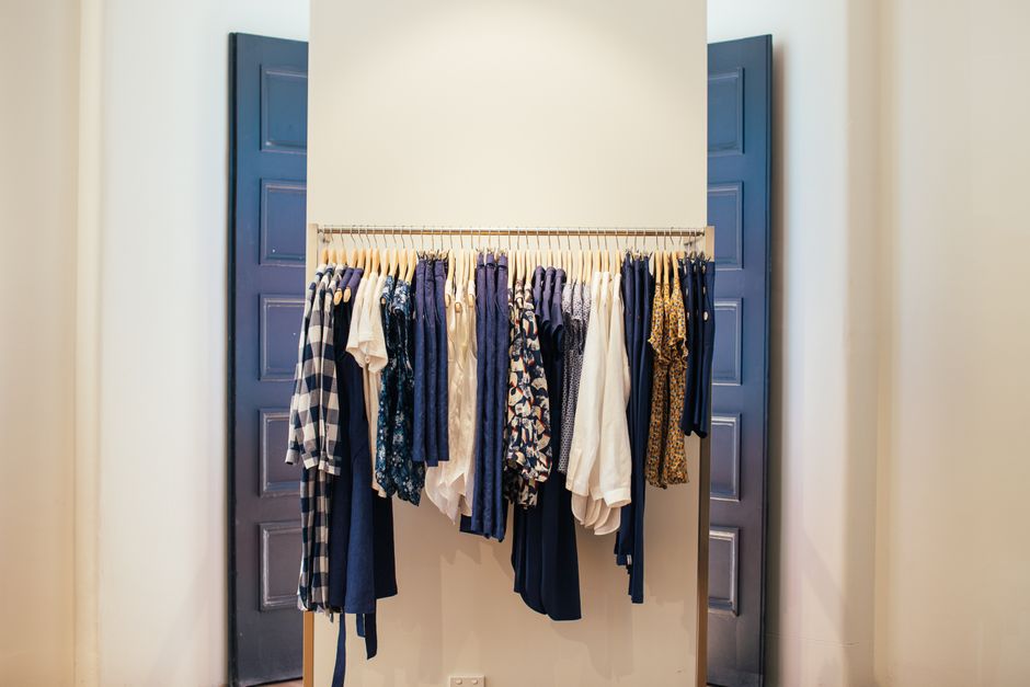 Assorted apparel on racks in a showroom
