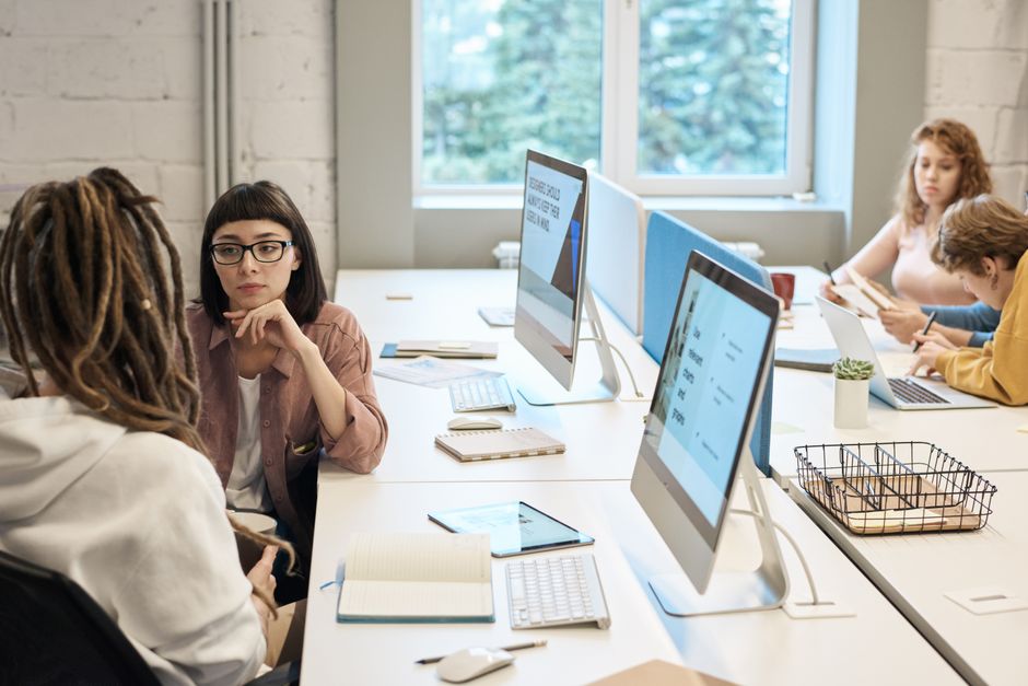 Office administrative staff working in a modern open space