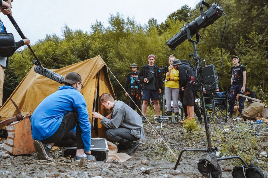 Documentary film crew shooting on location