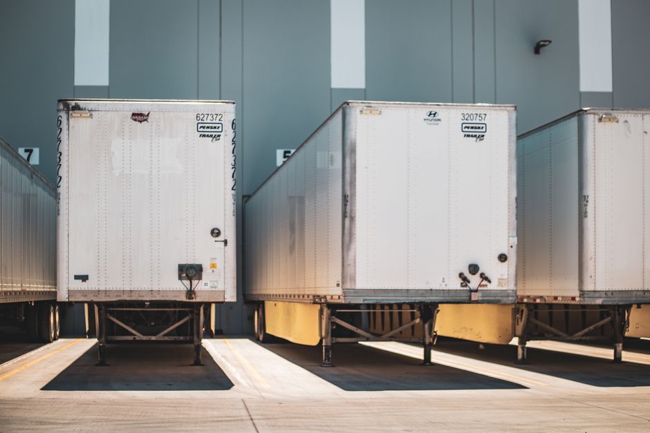 Loading docks at a warehouse with several drop trailers in position