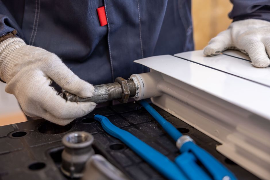 Repair work on a central heating system