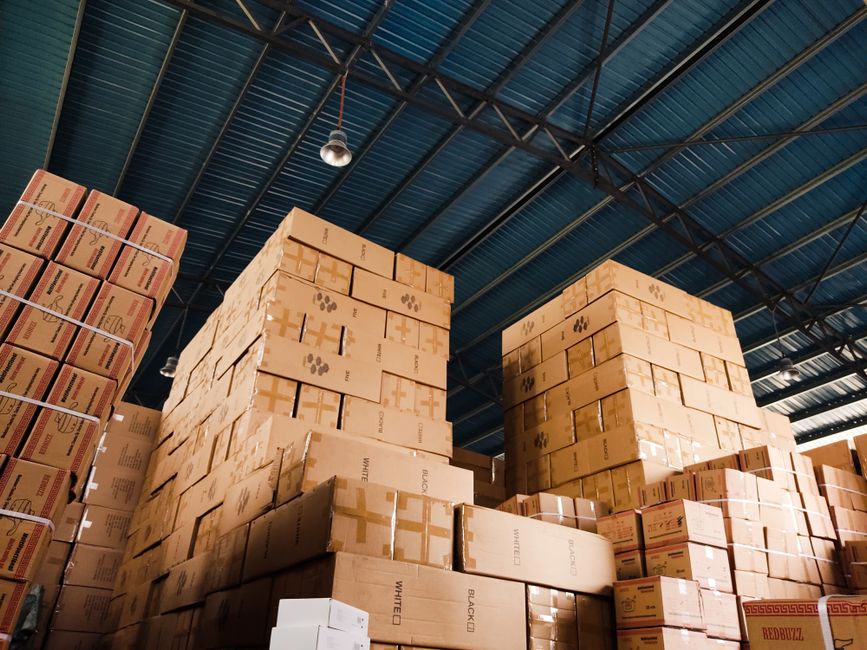 Warehouse with various AV and security equipment being prepared for distribution