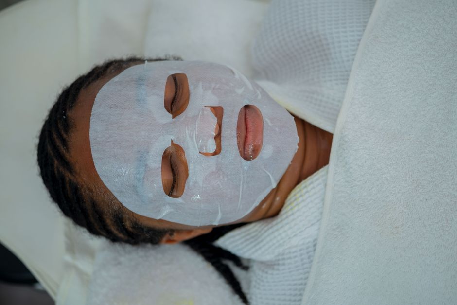 Client enjoying a relaxing facial skin care treatment