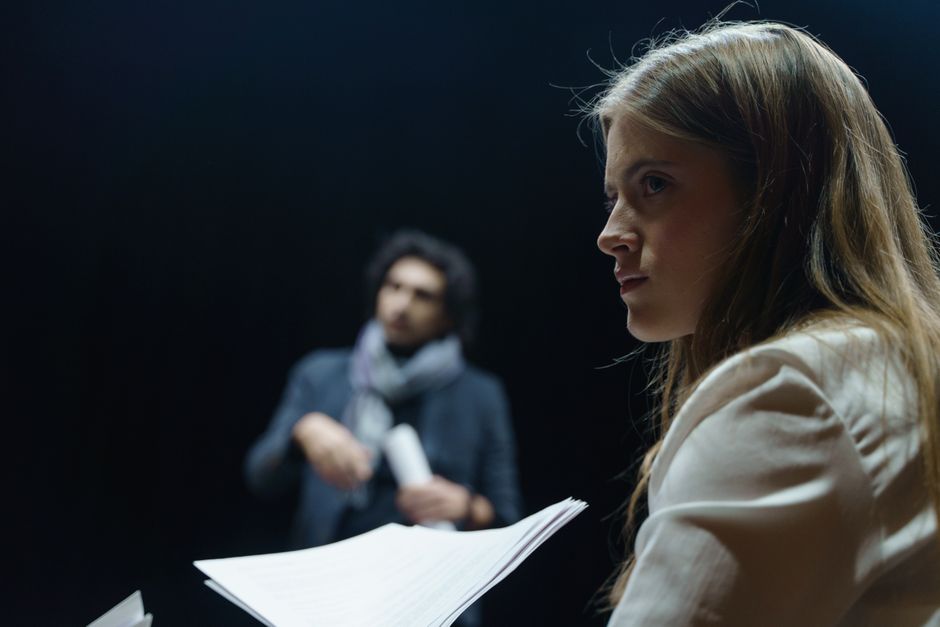 Women over 40 rehearsing a scene in a theatre
