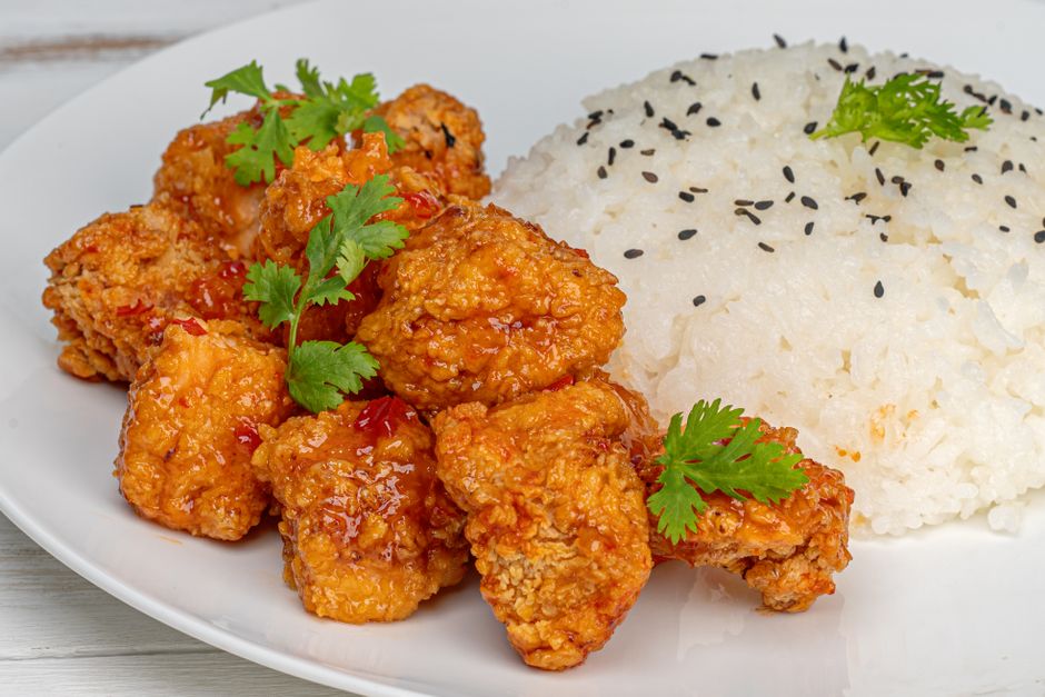 Orange chicken served with steamed white rice