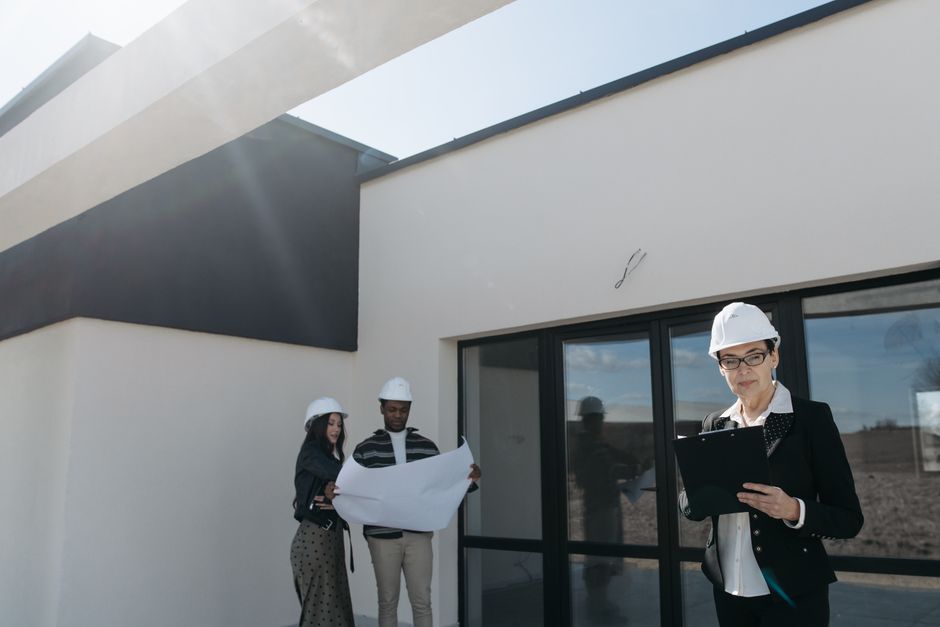 Colleagues overseeing commercial real estate management