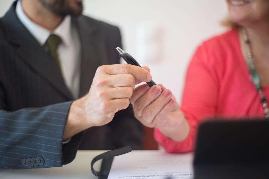 Consultants collaborating with clients in a professional setting