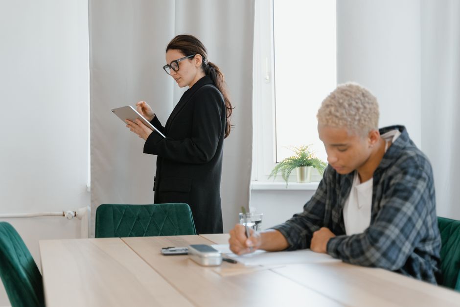 People using eLearning platforms in an office