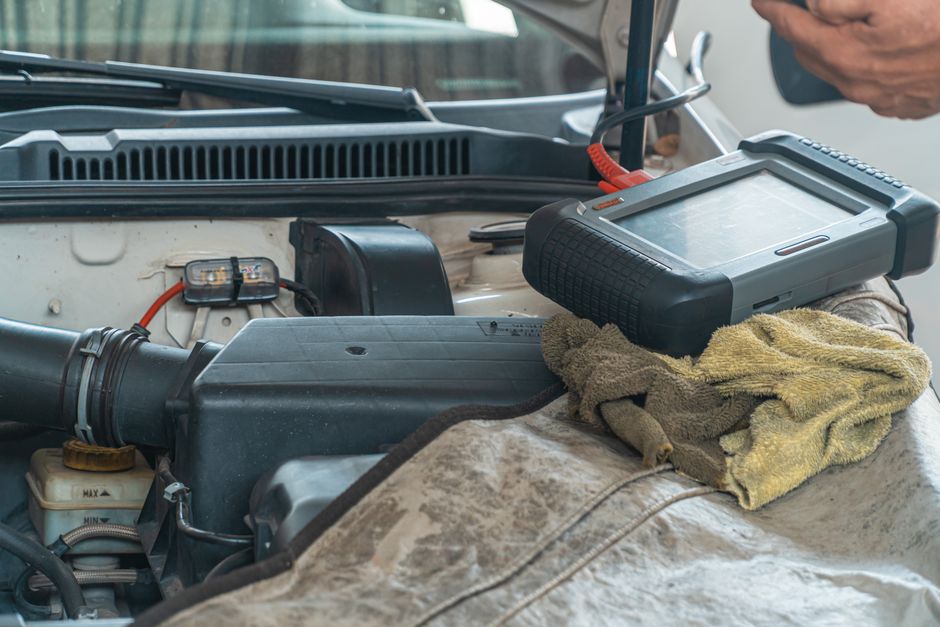 Diagnostic equipment in use at an auto repair workshop