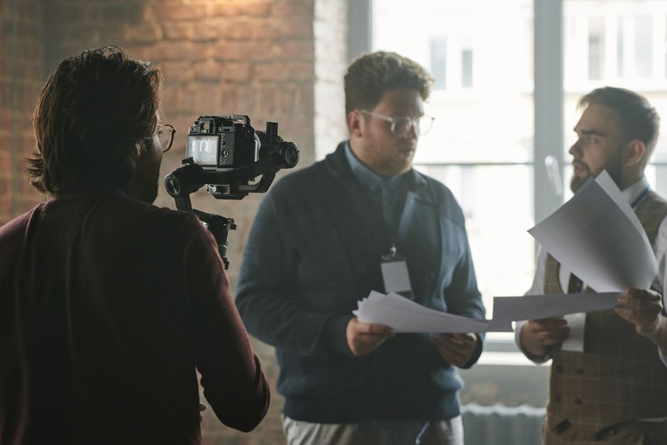 Film producer in a creative meeting with writers and directors