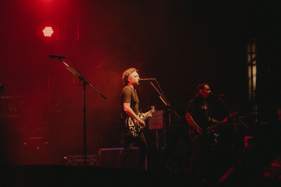 Dawes band performing on stage