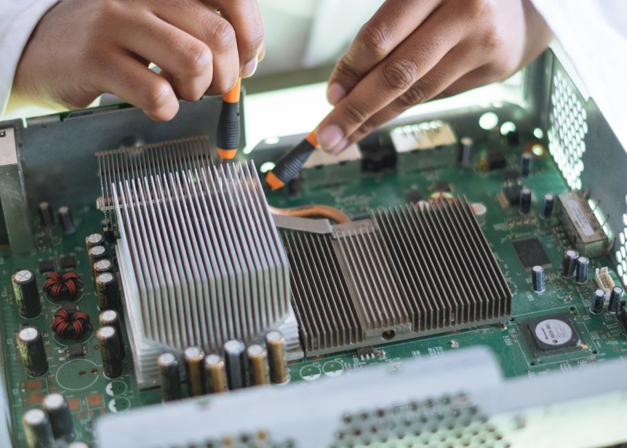Engineer consulting with client over electronics components