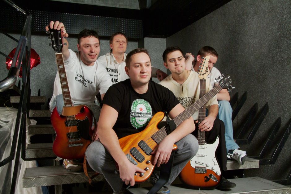 Group of musicians backstage during tour