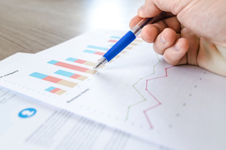 Researchers analyzing industry trends in an office