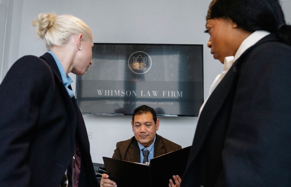 Team of legal consultants discussing consumer rights