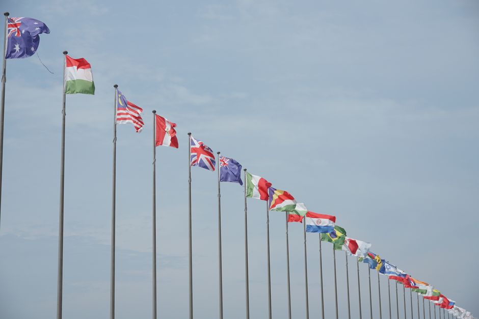 Business professionals facilitating international supply chain discussions