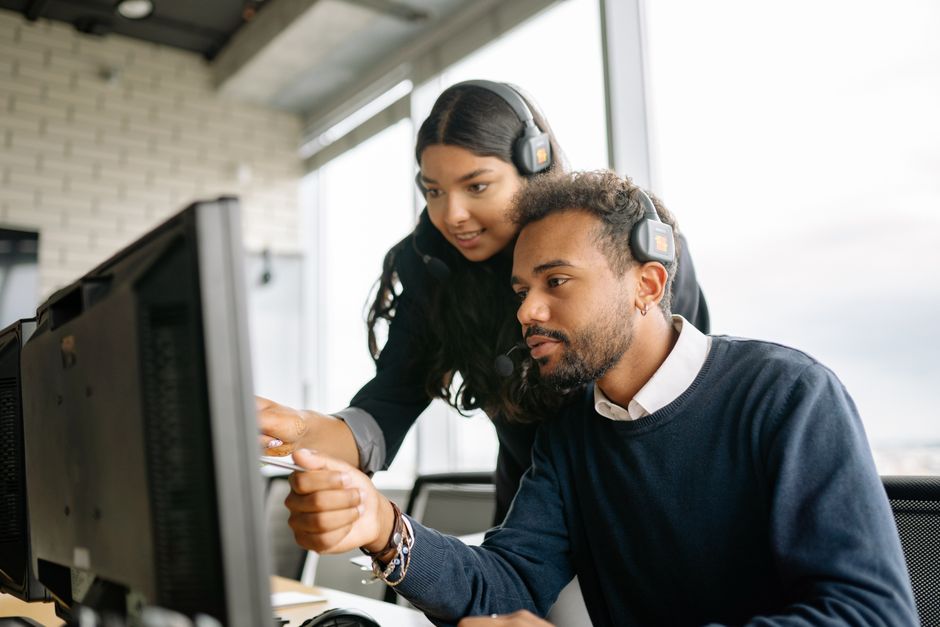 IT consultant discussing solutions with a business client