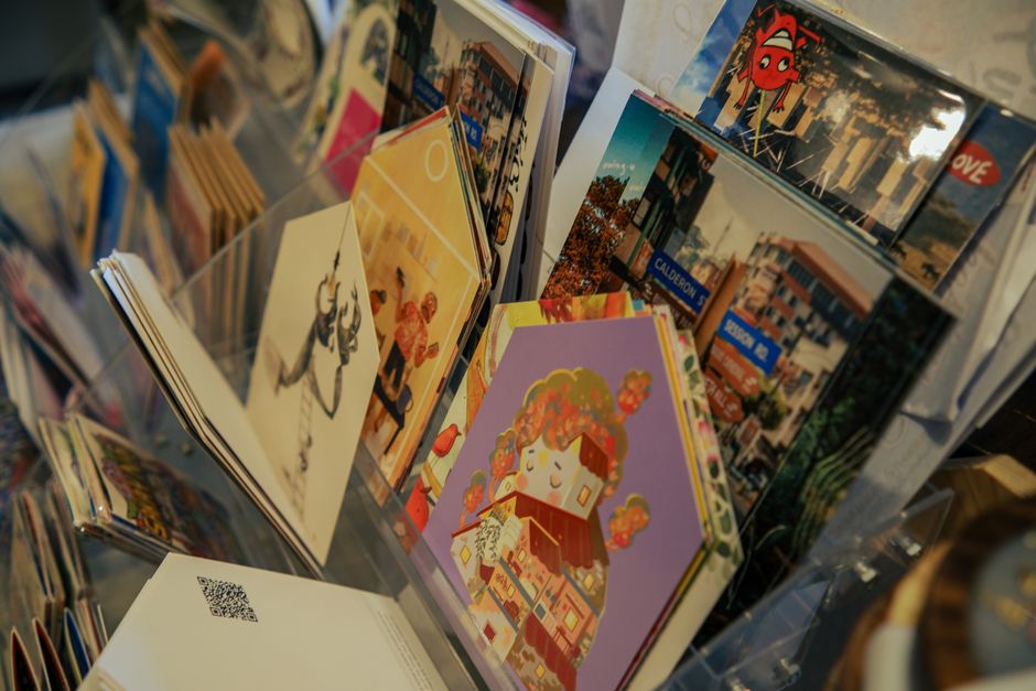 Gift cards and greeting cards on a shop counter