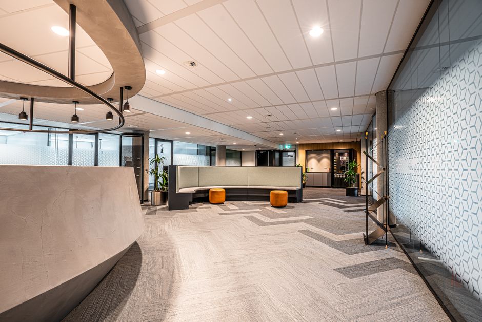 Office lobby featuring artistic wood wall panels