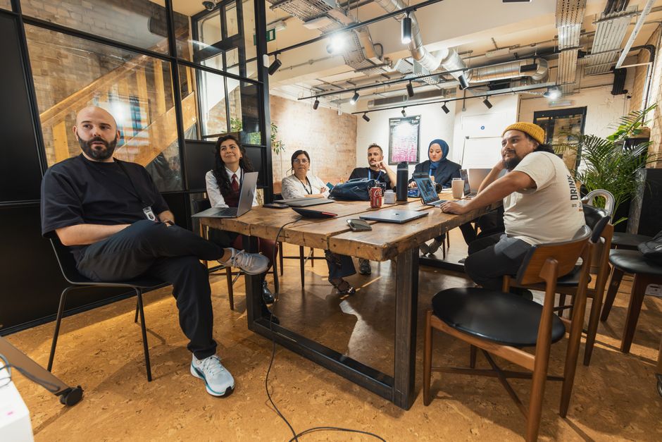 Group planning business strategy at a table