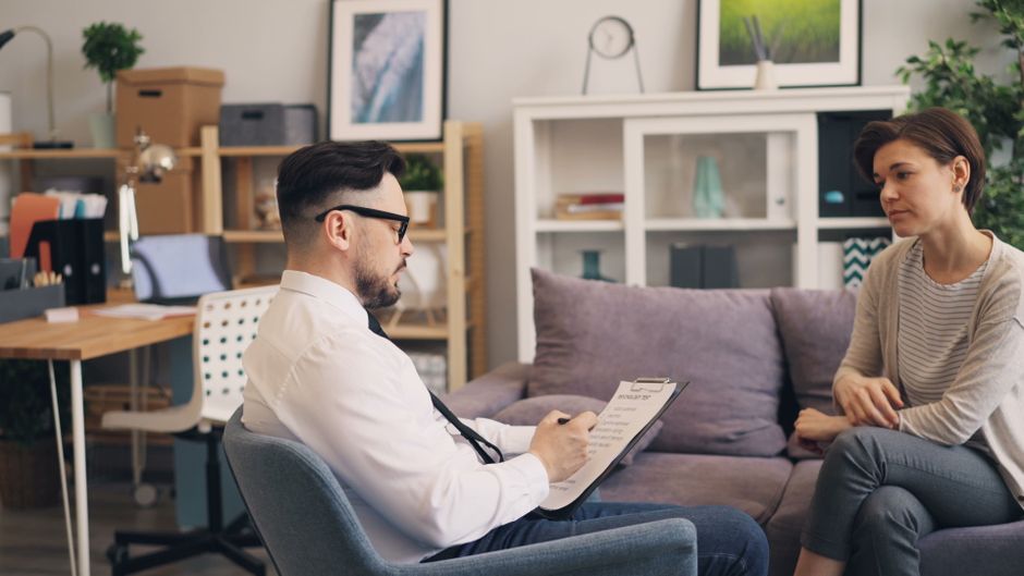 Psychologist helping a person with personality disorder in session