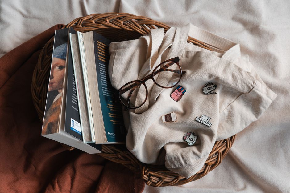 Gift-wrapped packages with handmade pins and trinkets.
