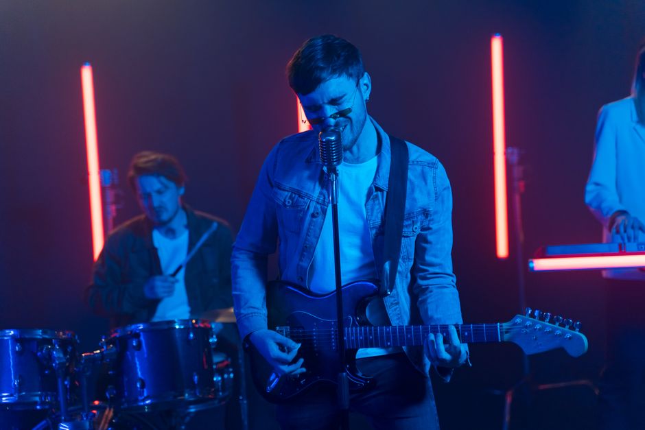 Pop rock band performing live on stage