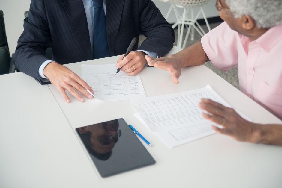 Business team discussing workers’ compensation coverage