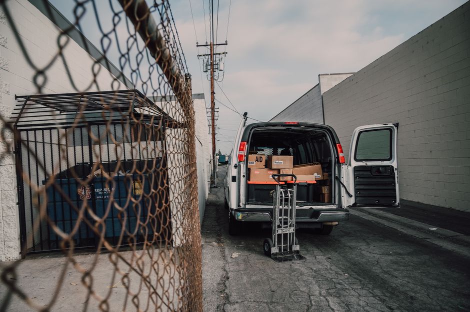 Moving truck being loaded with cardboard boxes