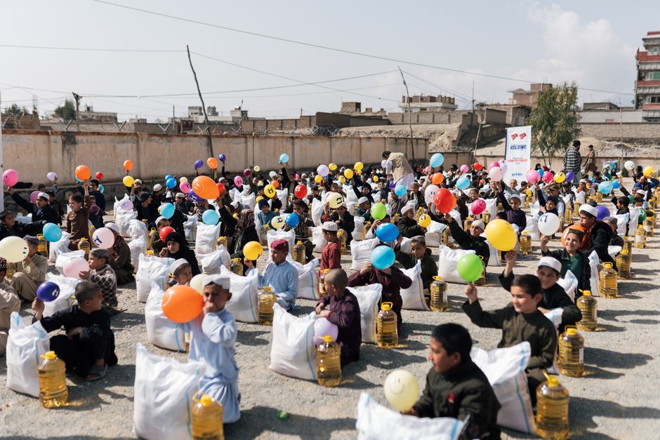 A lively charity fundraising event or festival attended by community members