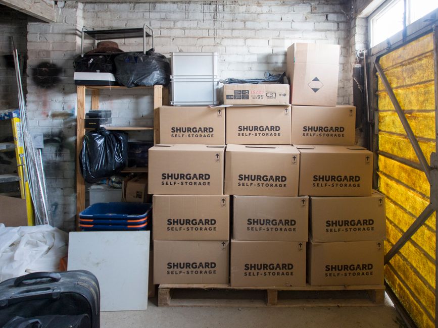 Rows of indoor self storage units with secure doors