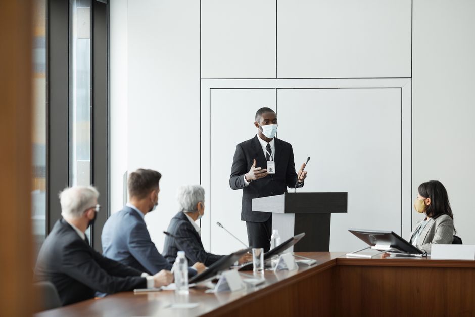 Professional discussion on compliance strategy in office setting