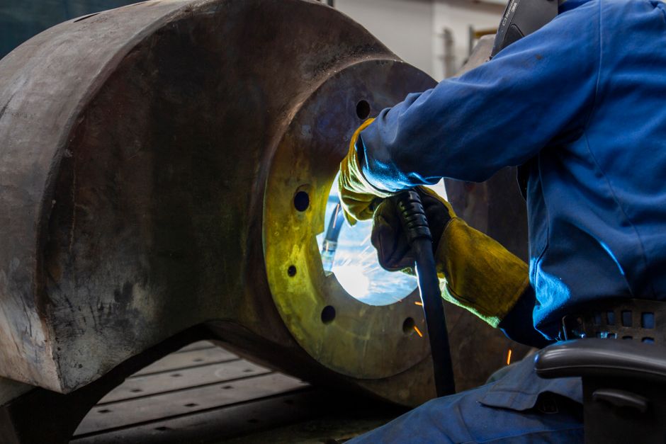 Welded steel assemblies prepared for installation