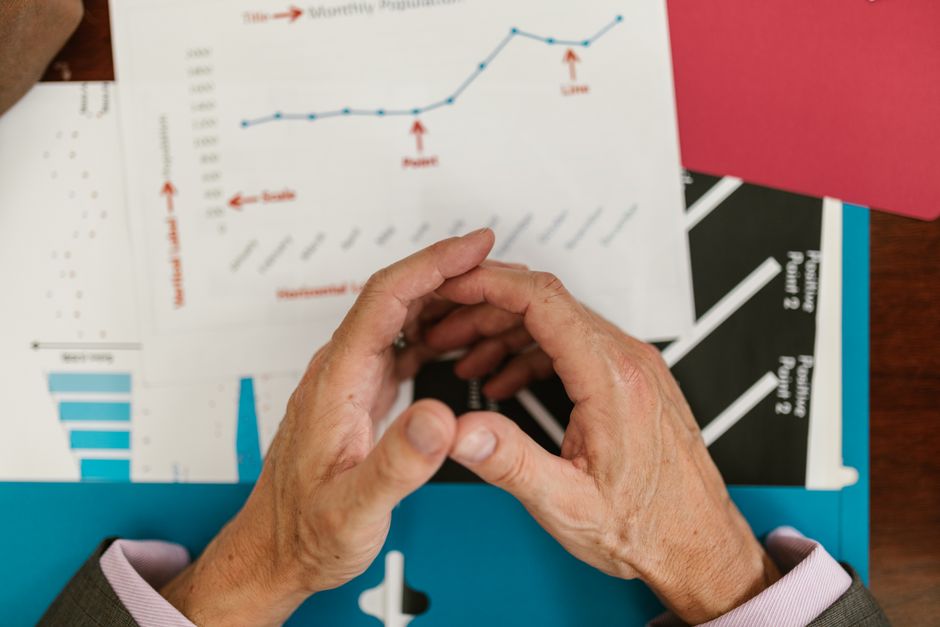 Consulting business people with growth reports
