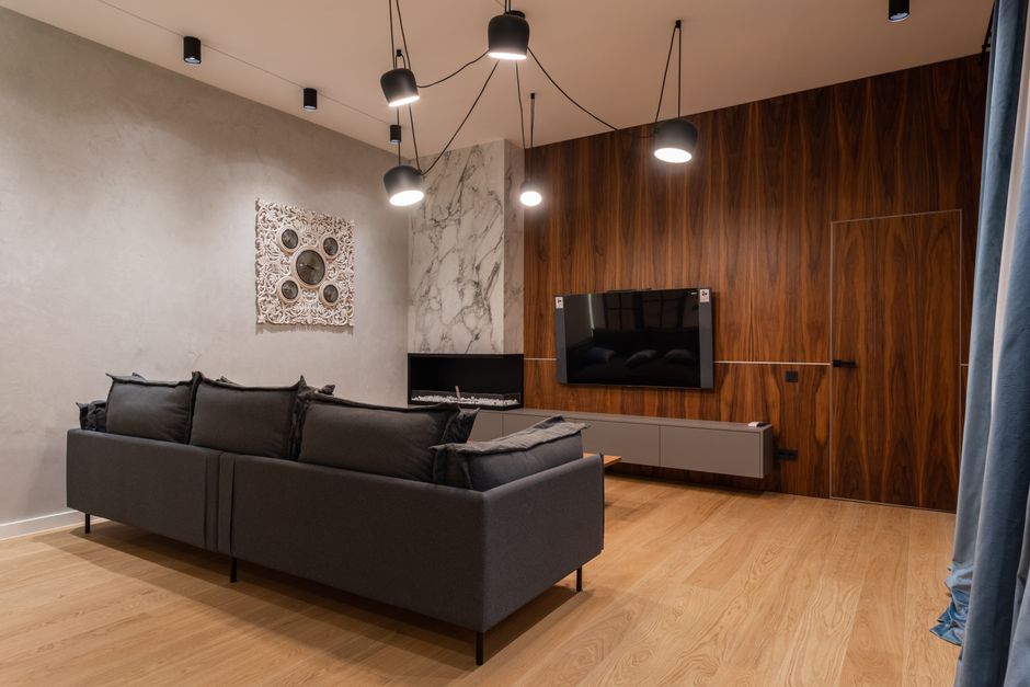 Modern living room with custom wood panel wall