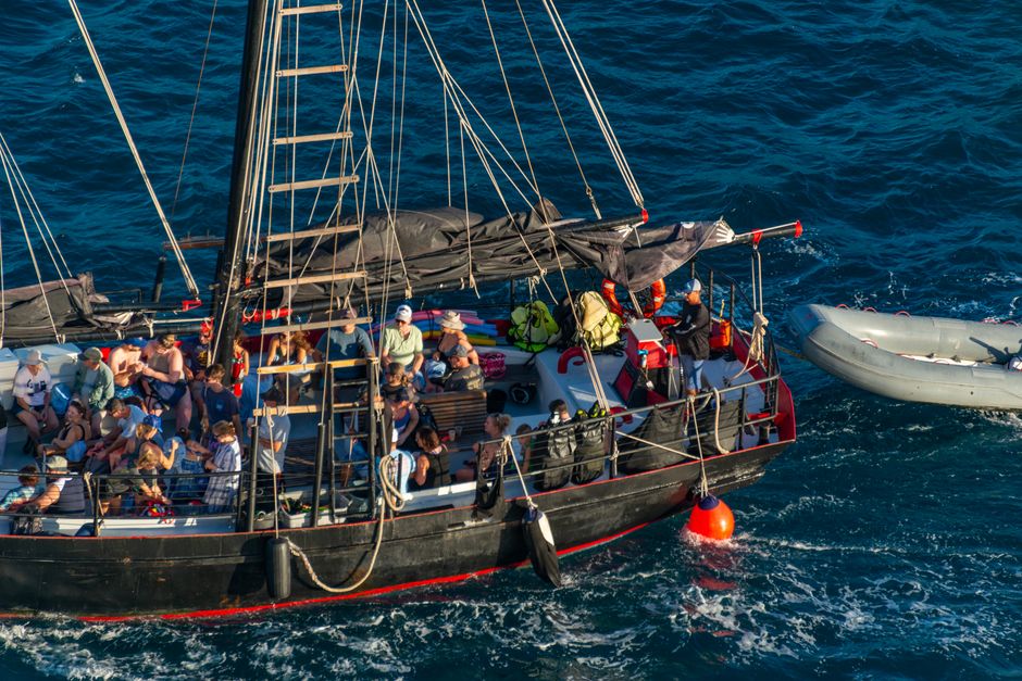 People enjoying an ocean cruise on a charter boat