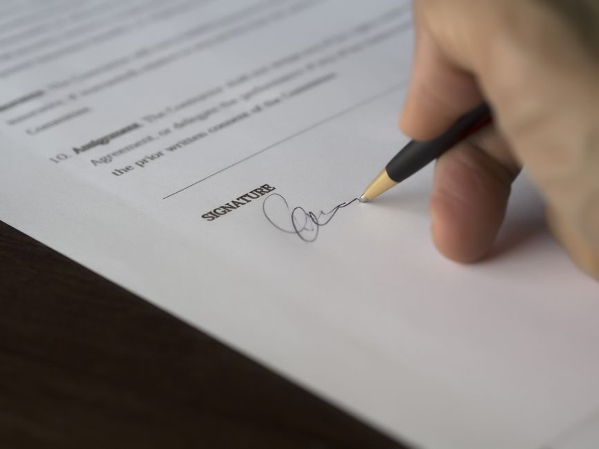 Client and representative discussing music licensing contracts