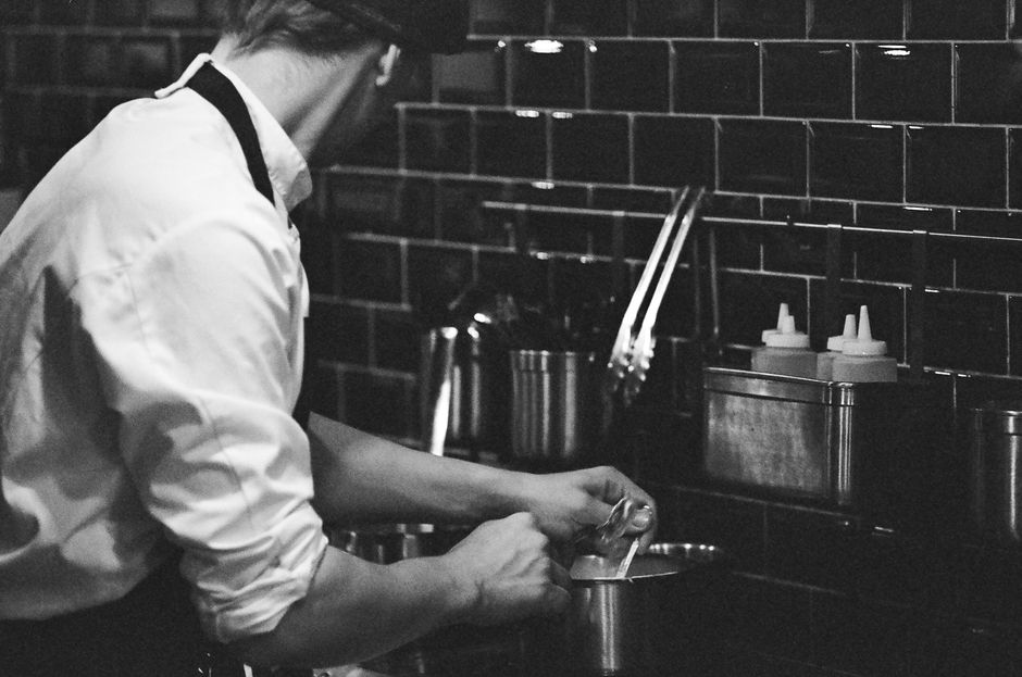 Chef working in a welcoming French bistro kitchen