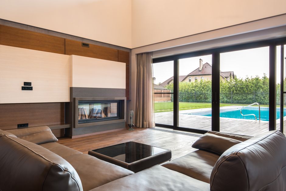 Panoramic sliding glass patio doors being installed