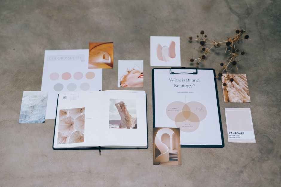 Graphic designer with color guides working on branding